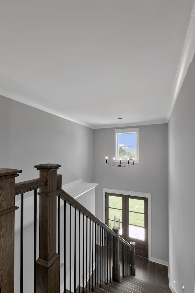 3025 Shady Forest Dr, Murfreesboro, TN 37128 - staircase featuring french doors, baseboards, a chandelier, wood finished floors, and ornamental molding