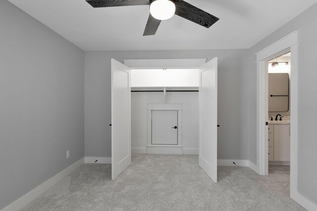 3025 Shady Forest Dr, Murfreesboro, TN 37128 - unfurnished bedroom featuring carpet floors, baseboards, ceiling fan, and a sink