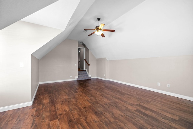 bonus room featuring lofted ceiling, dark wood-type flooring, and ceiling fan