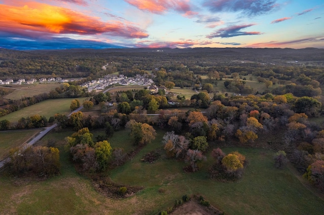 aerial view at dusk with a mountain view