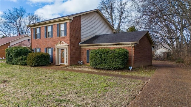 view of front of house with a front lawn