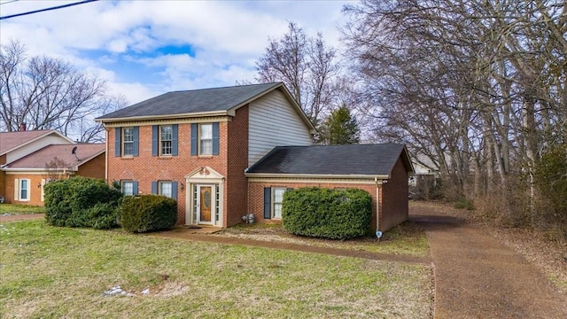 view of front of home with a front lawn