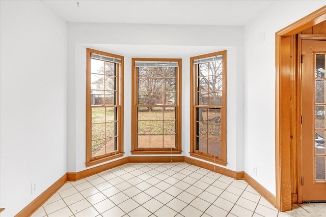 interior space with light tile patterned floors