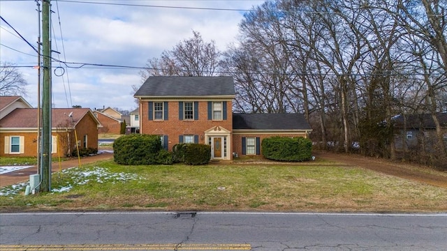 view of front facade with a front yard