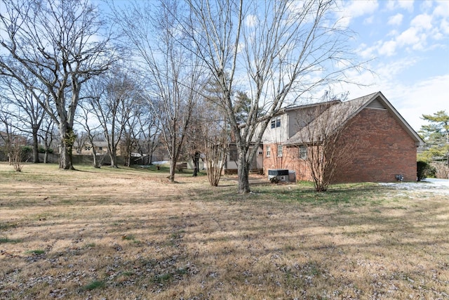 view of yard featuring central AC unit