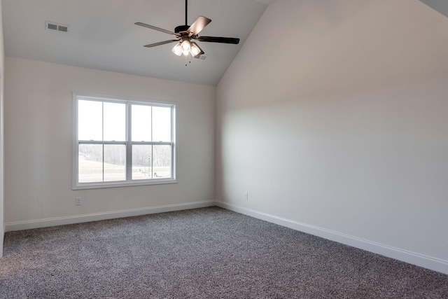 carpeted spare room featuring ceiling fan and lofted ceiling