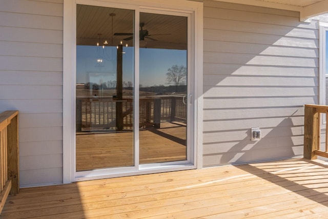 wooden deck with ceiling fan