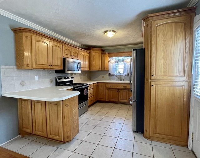 kitchen featuring light tile patterned floors, stainless steel appliances, tasteful backsplash, ornamental molding, and sink