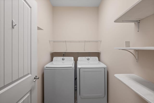 laundry area featuring washing machine and dryer