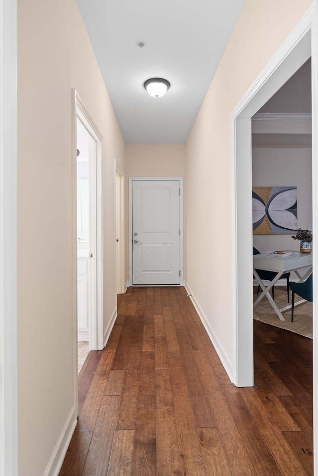 hallway featuring dark wood-type flooring