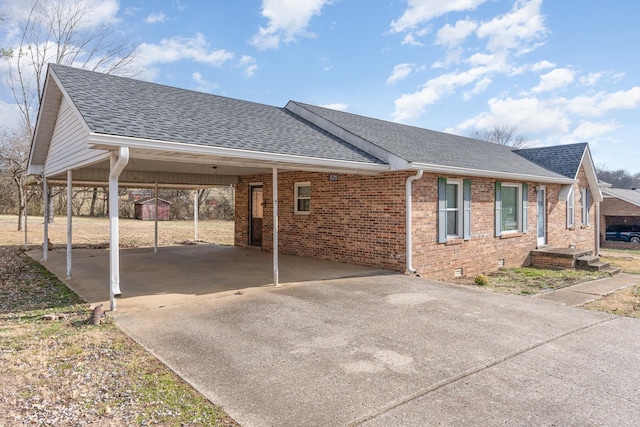 view of home's exterior featuring a carport