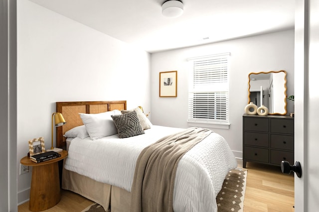 bedroom featuring light hardwood / wood-style floors