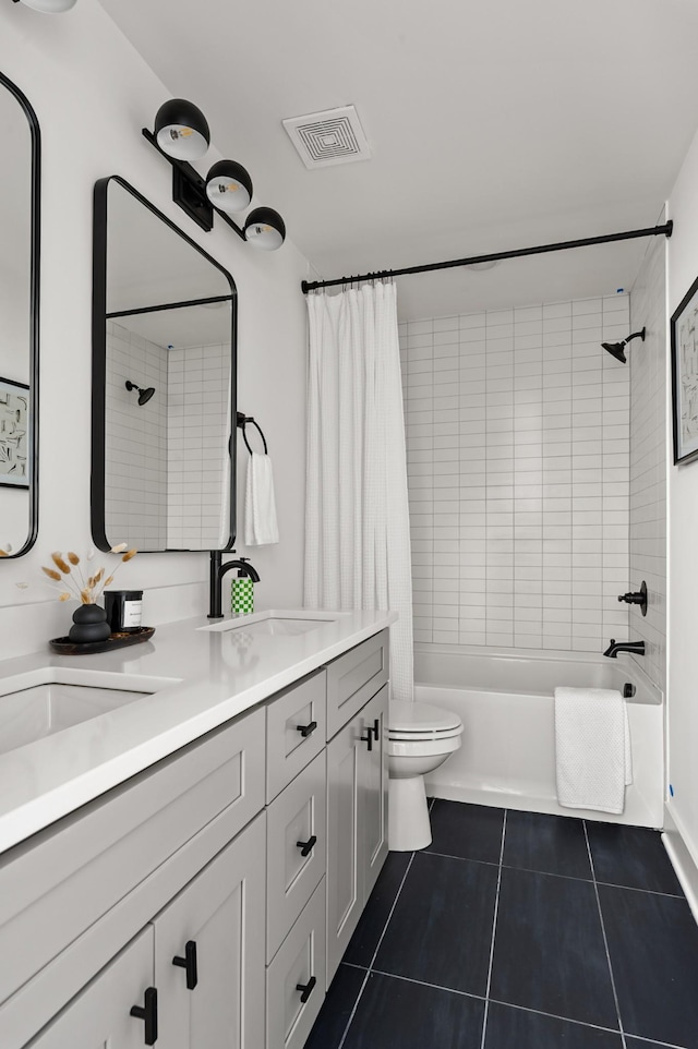 full bathroom featuring toilet, shower / bath combination with curtain, tile patterned floors, and vanity