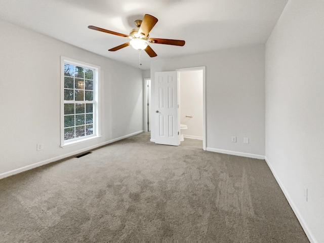 unfurnished room featuring carpet floors and ceiling fan