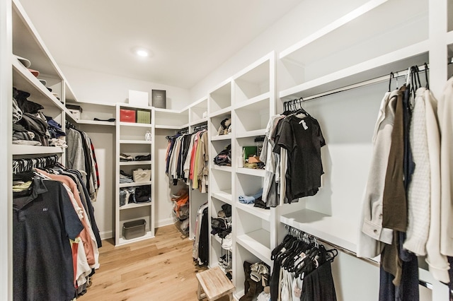 spacious closet featuring light wood-type flooring