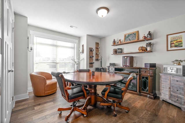 dining area featuring wood-type flooring