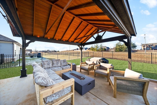 view of patio / terrace with a gazebo and an outdoor living space with a fire pit