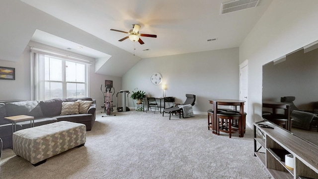 carpeted living room with lofted ceiling and ceiling fan