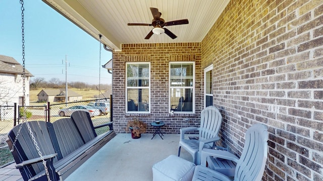 view of patio / terrace featuring ceiling fan