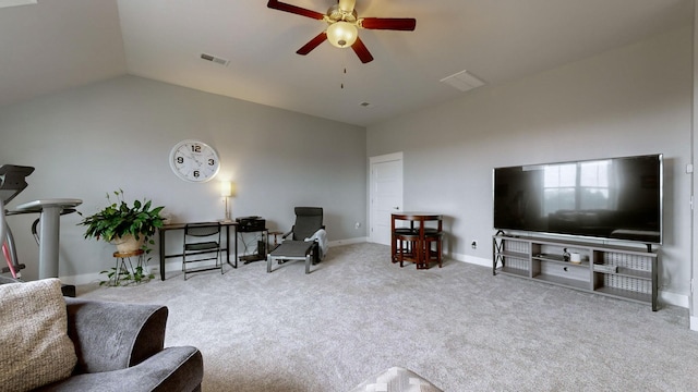 living room with ceiling fan, vaulted ceiling, and light carpet