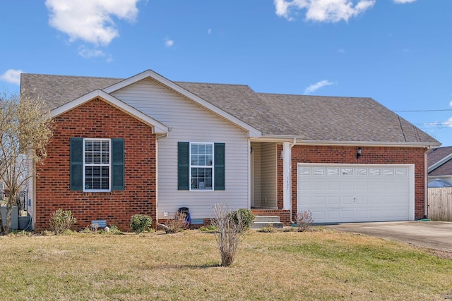 view of front of home featuring a front yard and a garage