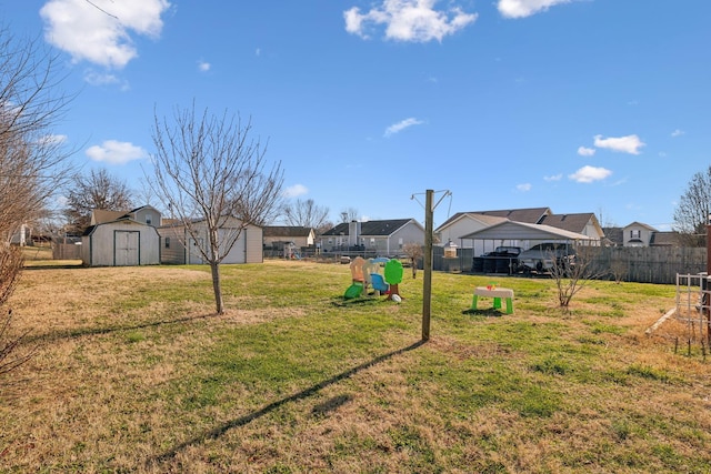 view of yard featuring a storage shed