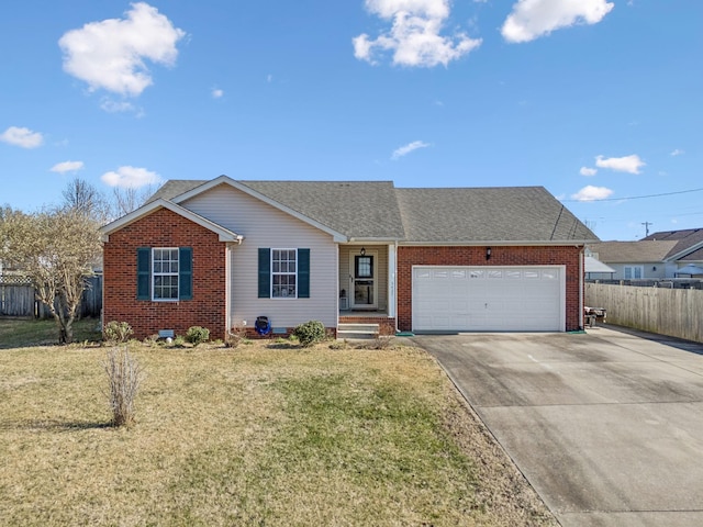 ranch-style home with a garage and a front yard