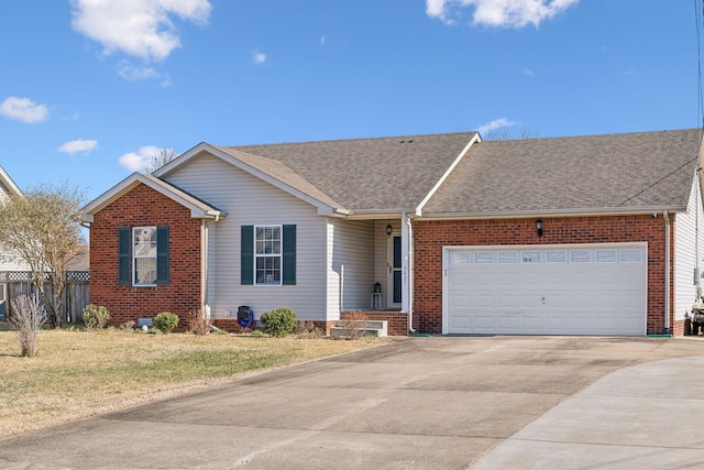 ranch-style house featuring a front lawn and a garage