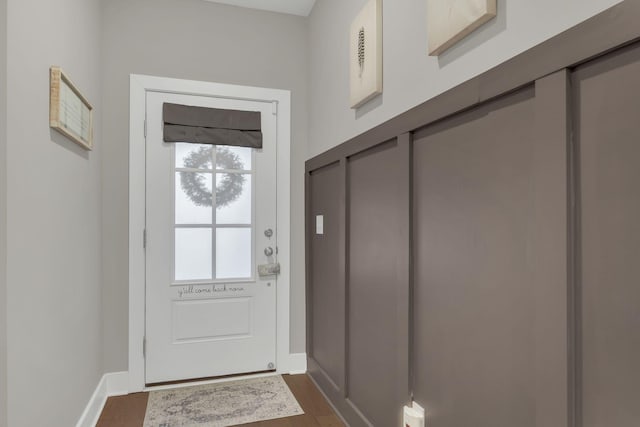 entryway featuring dark wood-type flooring