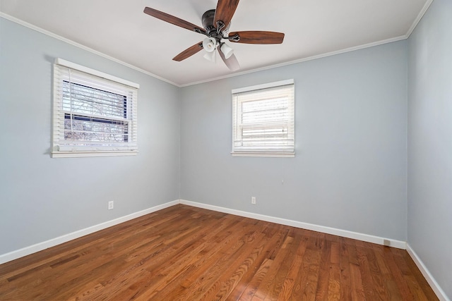 spare room with ceiling fan, ornamental molding, and hardwood / wood-style flooring