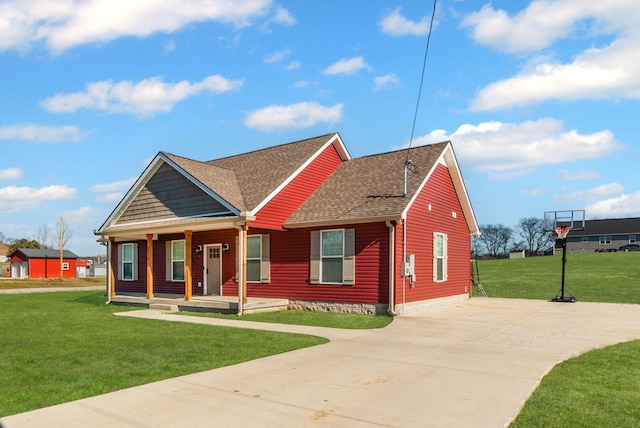 view of front of house featuring covered porch and a front yard