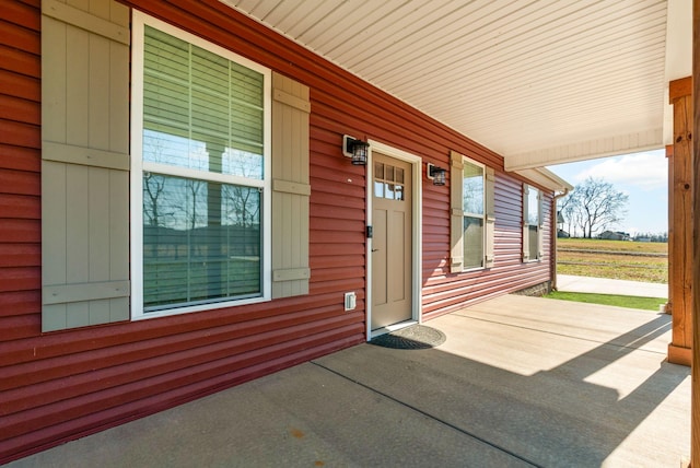 entrance to property with covered porch