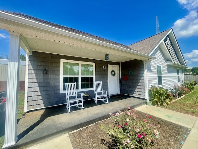 view of front of property featuring covered porch