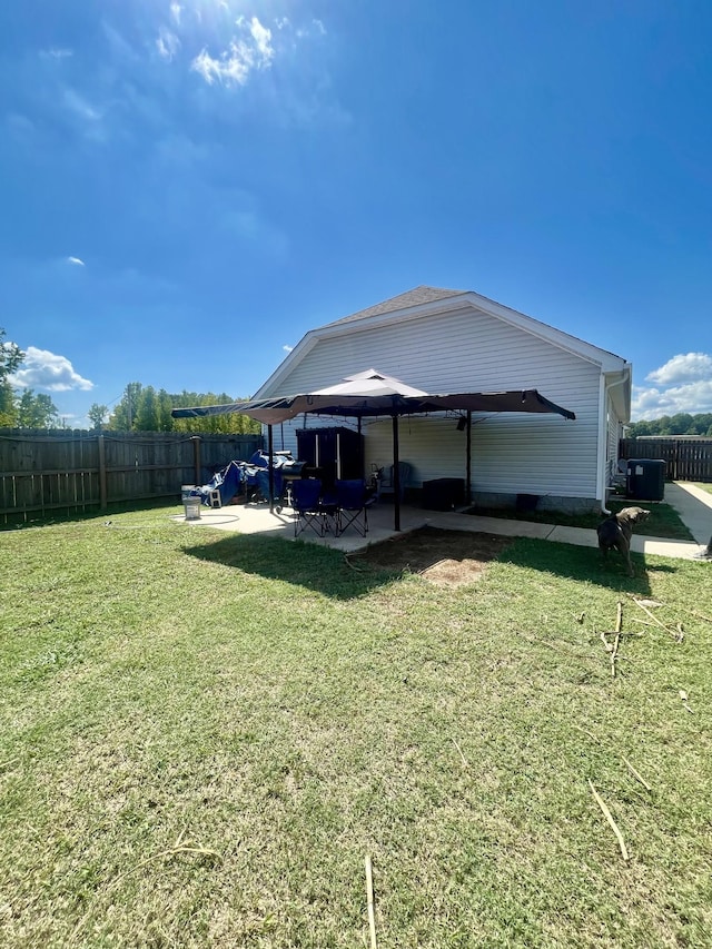 exterior space with a patio area, a gazebo, and a yard