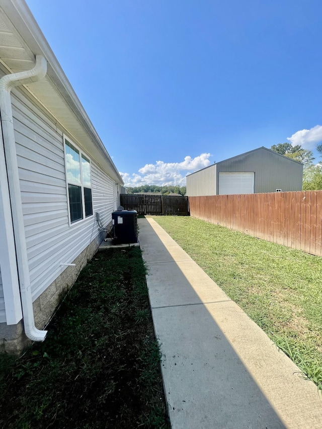 view of yard with central AC