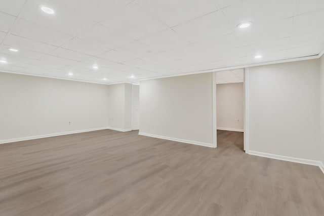 basement with wood-type flooring