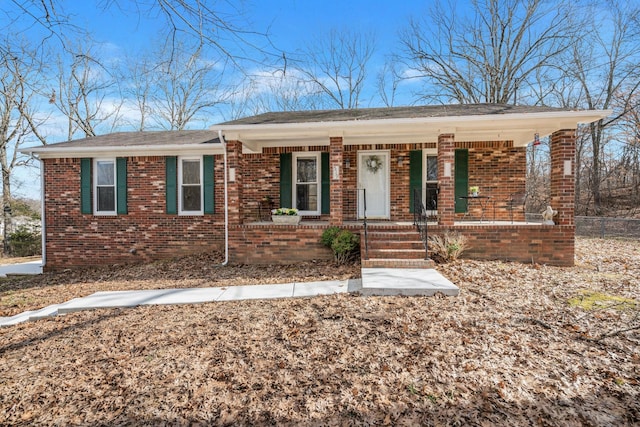 ranch-style house with covered porch