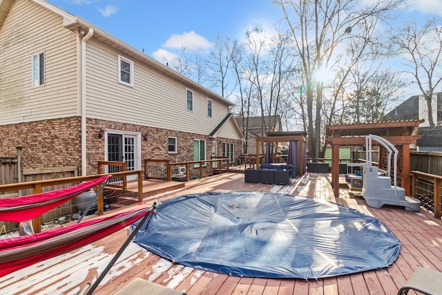 deck featuring outdoor lounge area