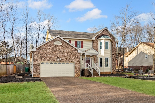 front facade with a garage and a front lawn