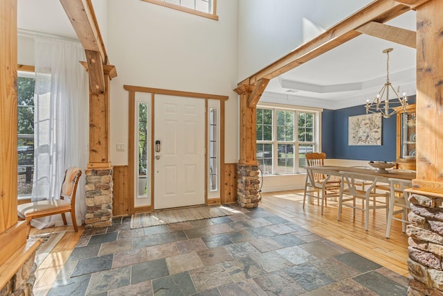 entrance foyer featuring a notable chandelier and a high ceiling