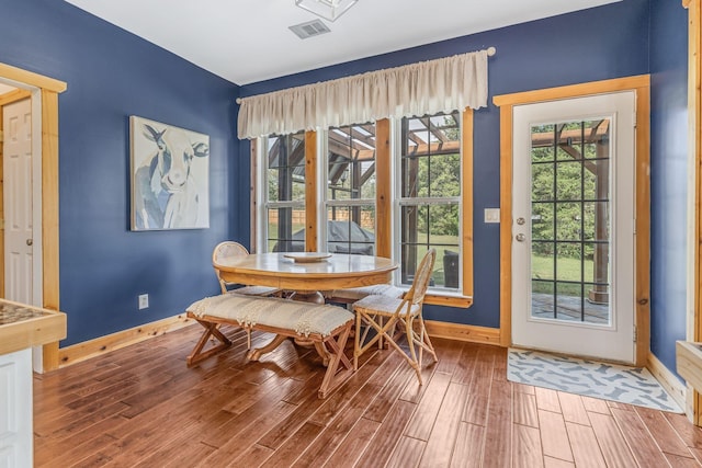 dining area featuring hardwood / wood-style flooring