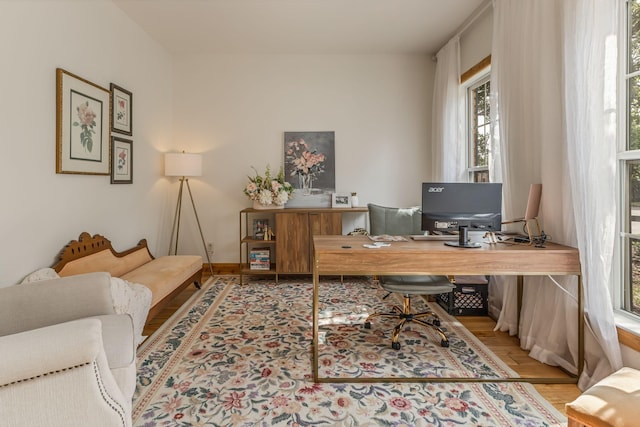 office area with light wood-type flooring