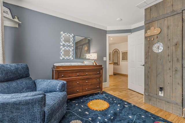 living area featuring hardwood / wood-style floors