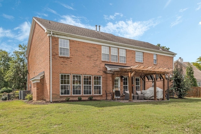 rear view of property with a lawn, cooling unit, a pergola, and a patio