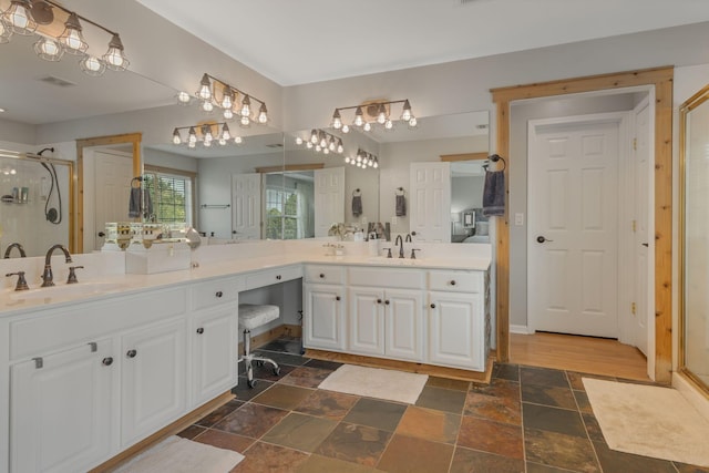 bathroom featuring vanity and walk in shower