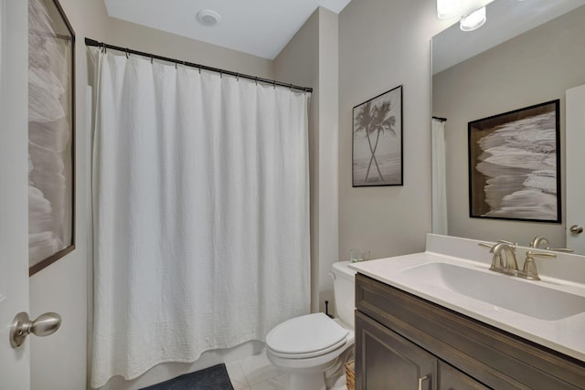 bathroom with toilet and vanity