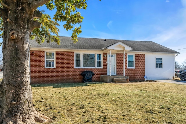 ranch-style house with a front lawn