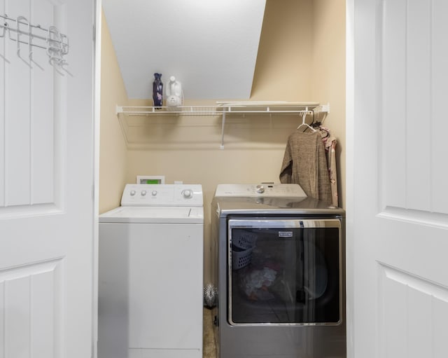 laundry room featuring separate washer and dryer