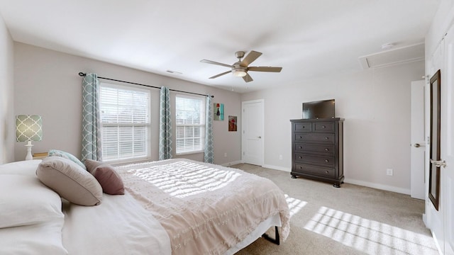 bedroom with ceiling fan and light colored carpet