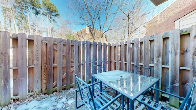 view of snow covered patio